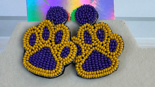 Purple and yellow paw print earring